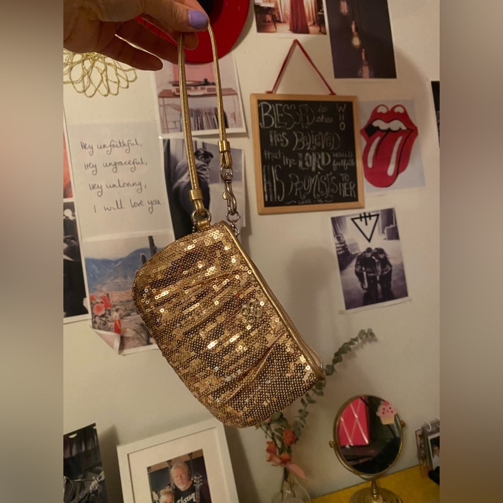 Glitter gold coach wristlet